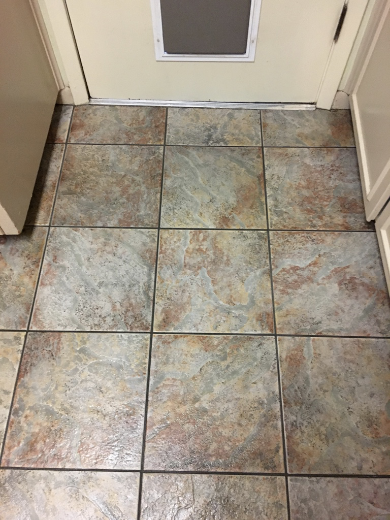 Dirty tile floor in Austin before
